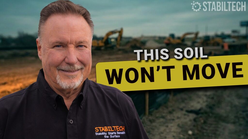 StabilTech expert standing in front of a Texas construction site where high-plasticity clay soil is being treated with STX90 ionic stabilization to prevent slab heave